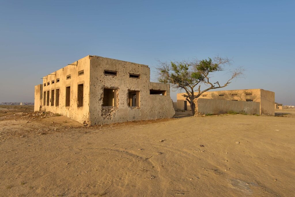 Ruined old school building in the abandoned village of Al Ghariya