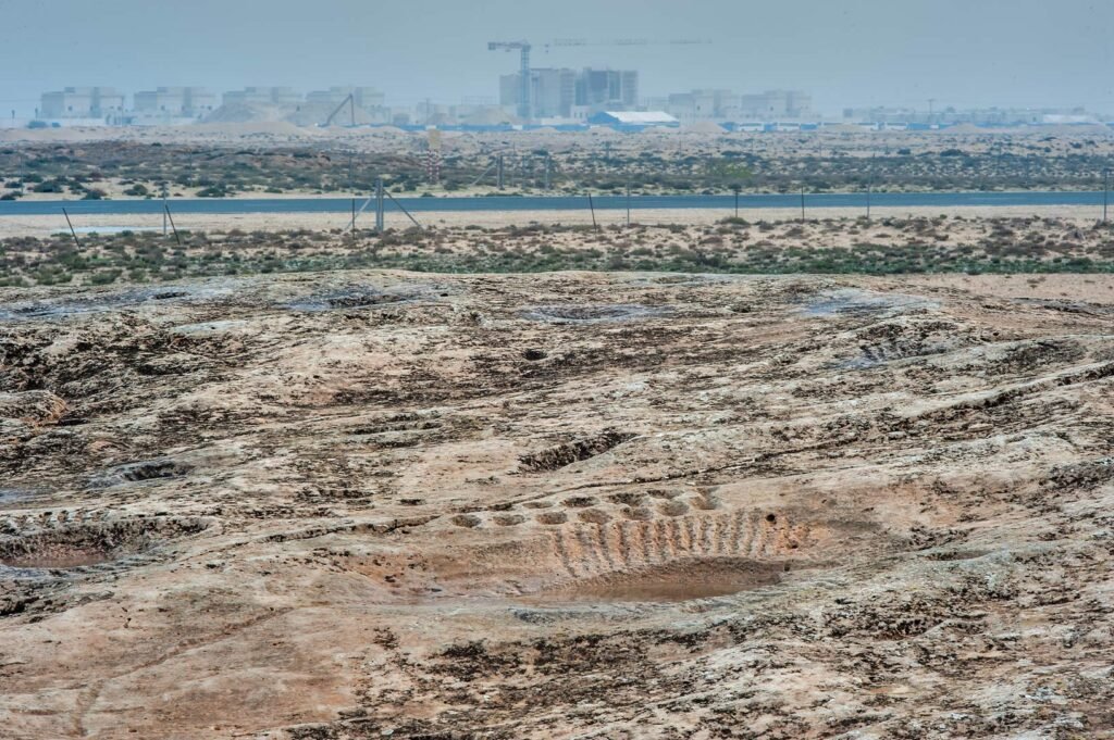 View east from the rocky ridge of Jebel Jassasiya towards the coast