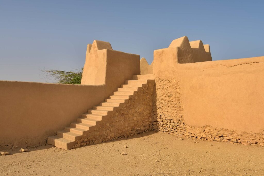 Stone staircase leading up to the roof inside Al Rakiyat Fort