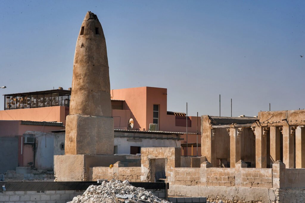 The conical minaret on a square base at the historic Al Ruwais Mosque