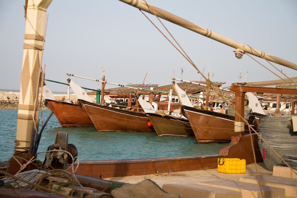 Wooden dhows moored in the harbour at Al Ruwais
