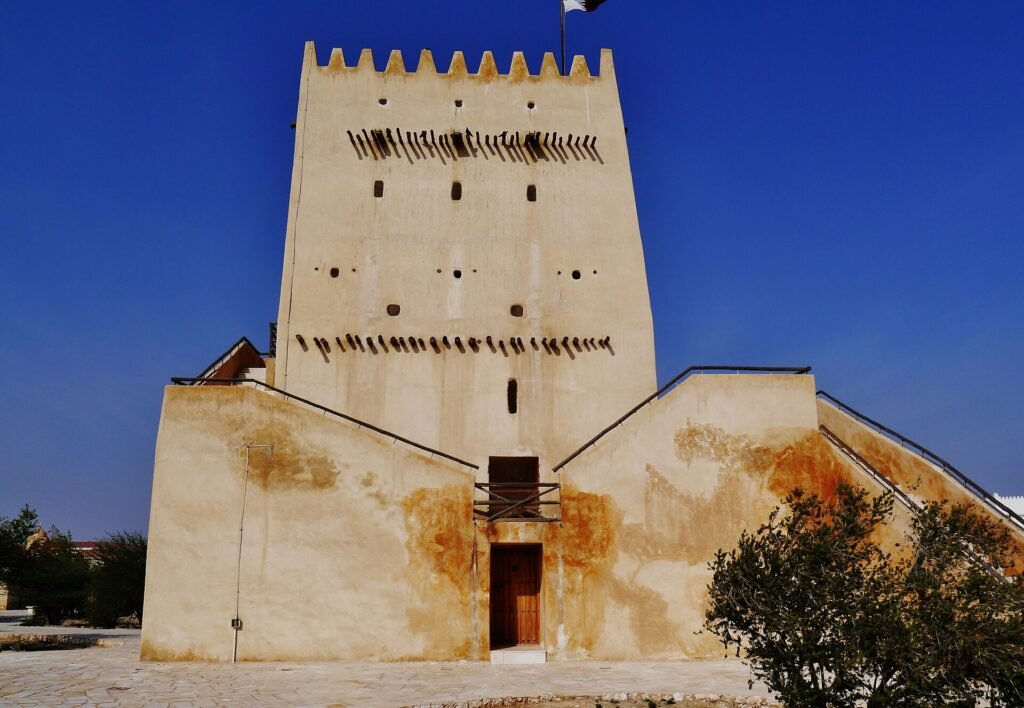 The rectangular eastern tower of the Barzan Towers with crenellated parapet