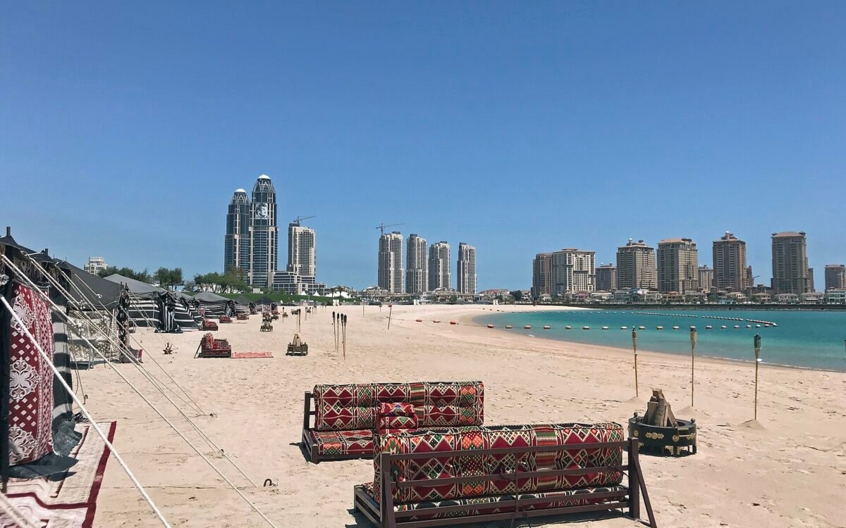 Katara Beach in Doha with the Lusail skyline behind the sand
