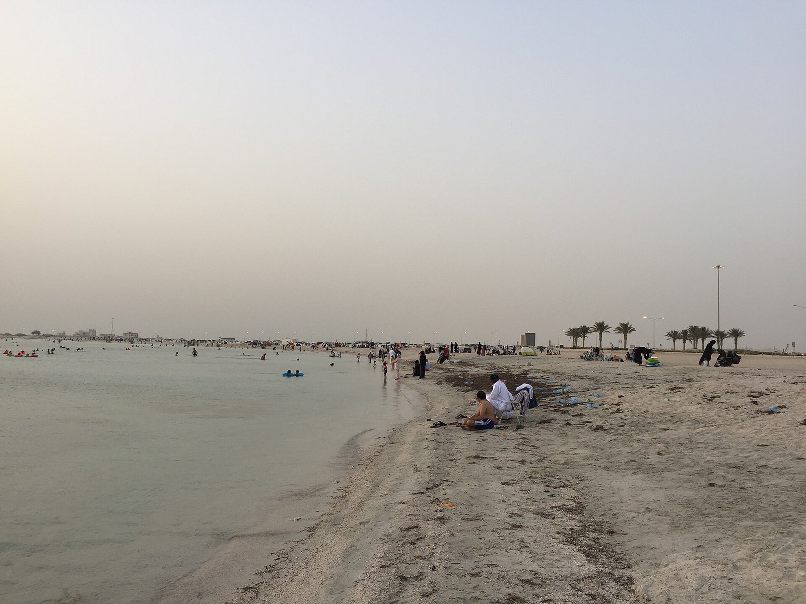 Shallow water and pale sand at Dukhan public beach on the west coast of Qatar