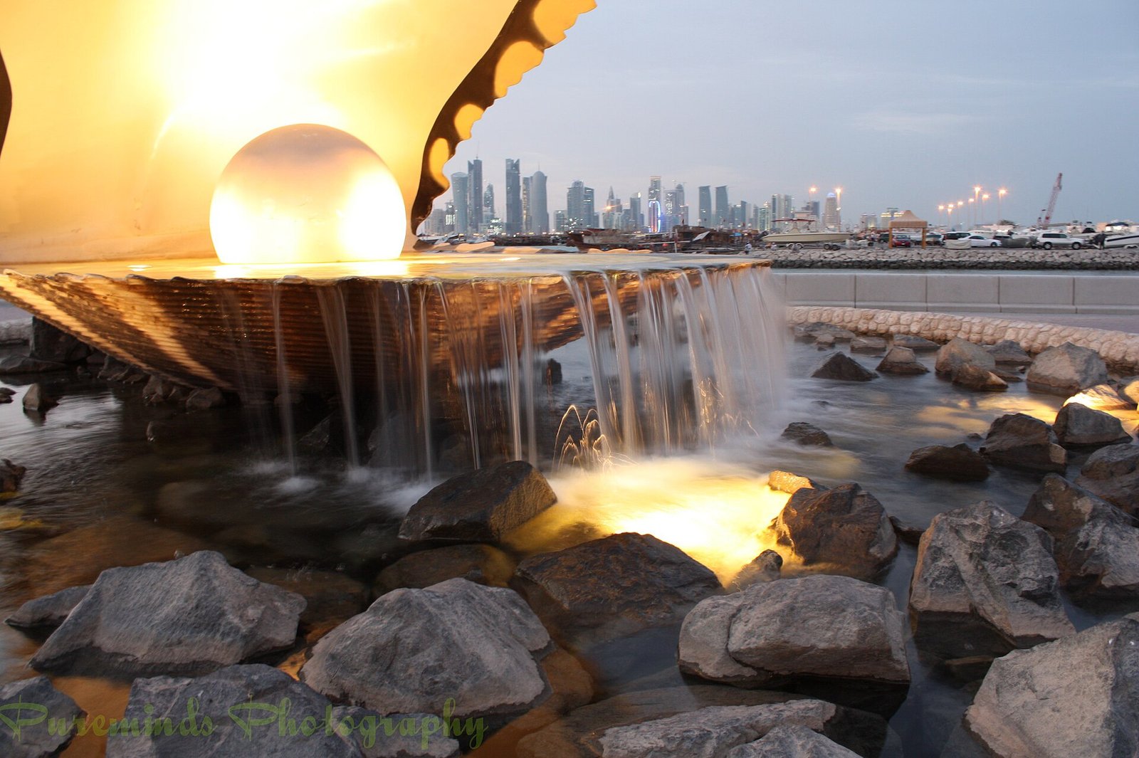 The Pearl Monument fountain on the Doha Corniche, an open oyster shell holding a pearl