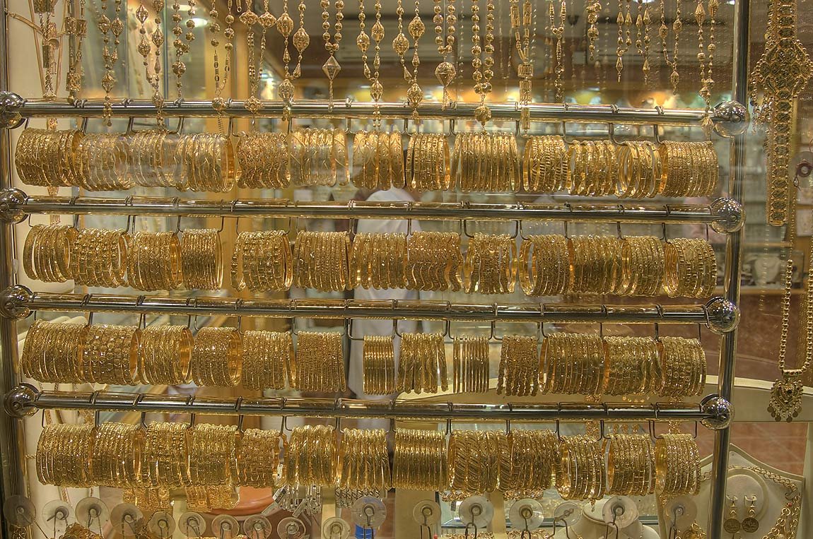 Rows of gold bracelets and necklaces in a Gold Souq window, Doha