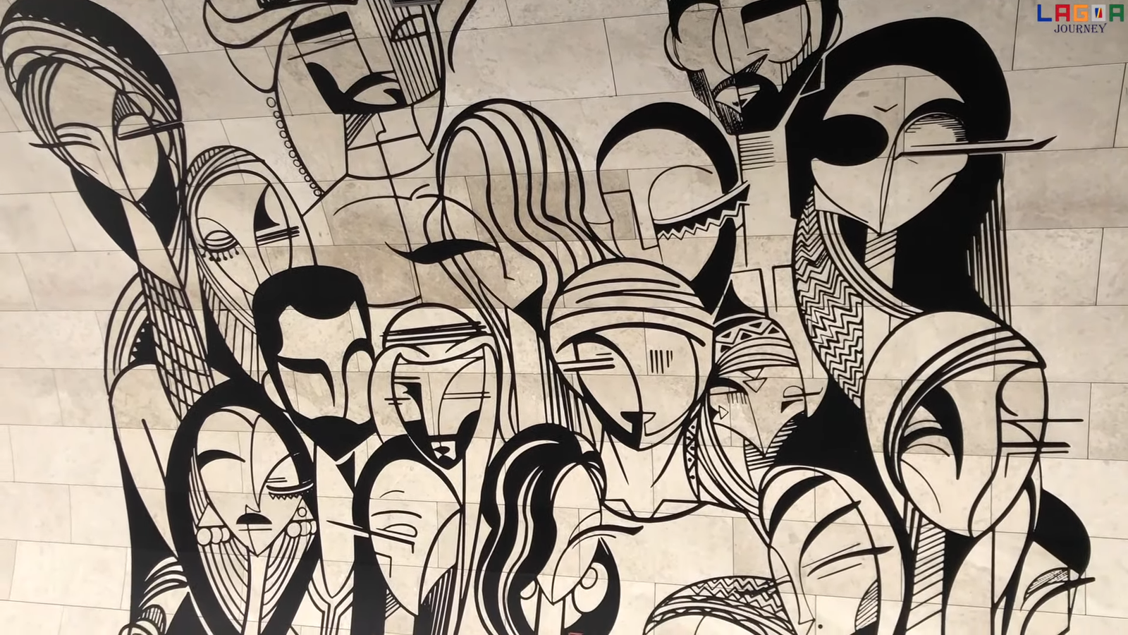 A large art mural on a building wall in Msheireb Downtown Doha