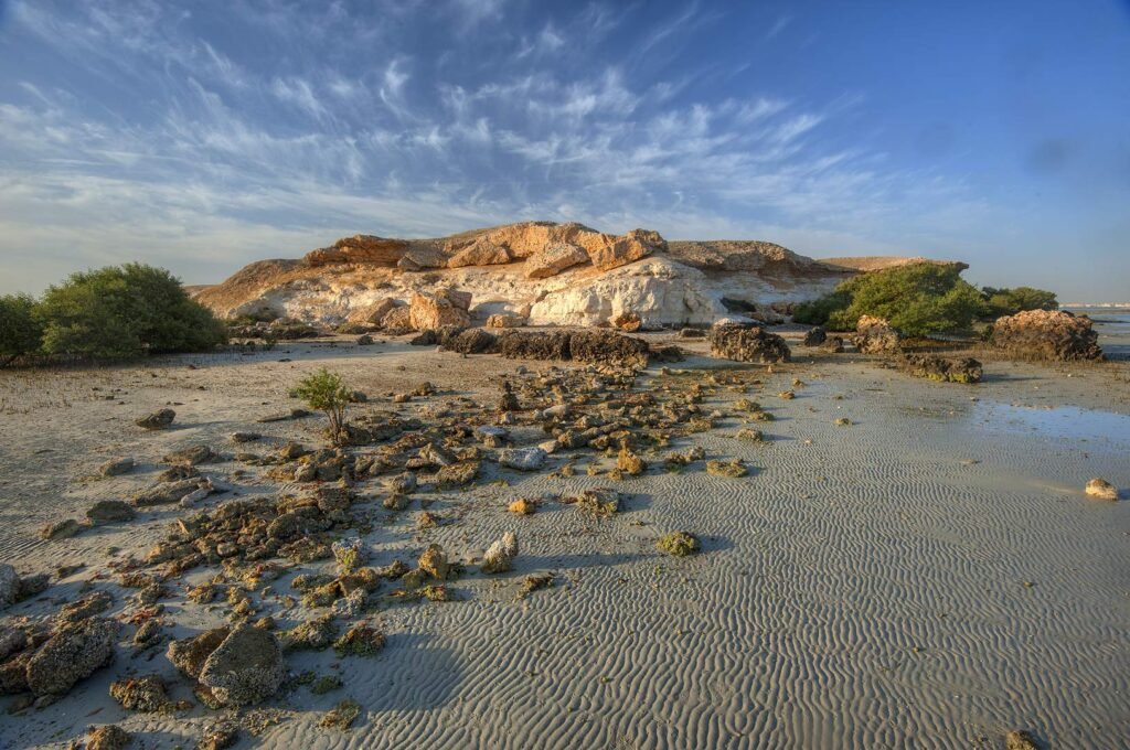 Limestone hillock and beachrock at the northern end of Purple Island at low tide