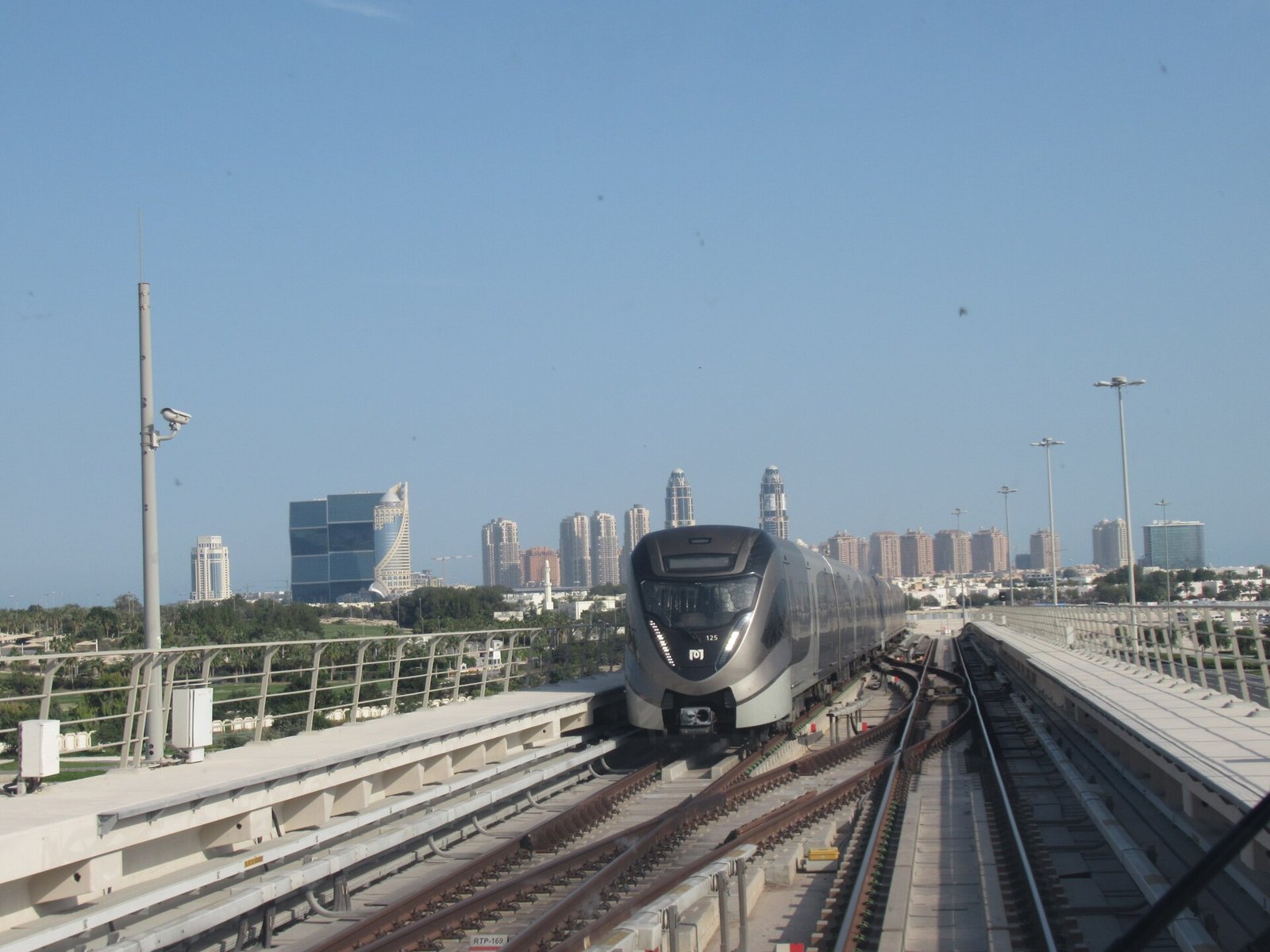 Doha Metro Red Line train on an elevated section of track