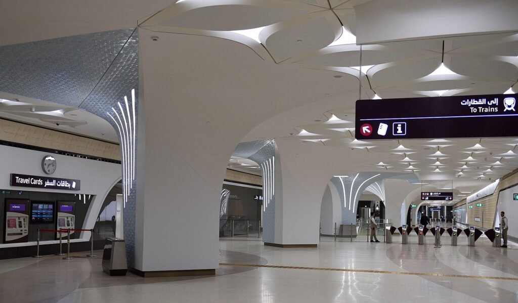 Ticket gates and concourse inside a Doha Metro station