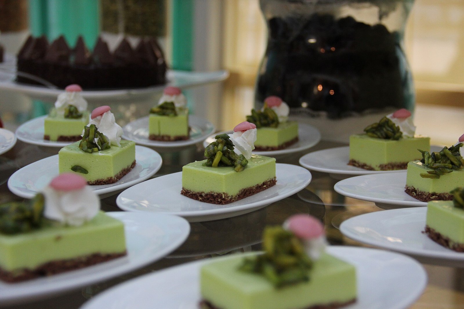 Plated desserts laid out at a hotel iftar buffet in Doha